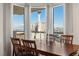 Dining room with large windows framing a remarkable view of the city skyline and mountains at 2777 Paradise Rd # 1105, Las Vegas, NV 89109
