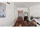 Long hallway featuring hardwood floors, neutral decor, and elegant lighting at 2777 Paradise Rd # 1105, Las Vegas, NV 89109