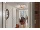 Inviting hallway with hardwood floors, neutral walls, and an elegant lighting fixture at 2777 Paradise Rd # 1105, Las Vegas, NV 89109