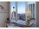 Well-lit office features city views including Strat, modern desk, clear chair, blending work with scenic Las Vegas vistas at 2777 Paradise Rd # 1105, Las Vegas, NV 89109