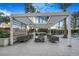 Relaxing outdoor lounge area featuring comfortable seating, a modern pergola, and a built-in grill perfect for entertaining at 2777 Paradise Rd # 1105, Las Vegas, NV 89109