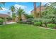 Landscaped backyard with tiered retaining walls at 2891 Painted Lilly Dr, Las Vegas, NV 89135