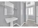 Elegant bathroom with pedestal sink and shower at 2891 Painted Lilly Dr, Las Vegas, NV 89135