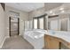 Bathroom with a large soaking tub and walk-in shower at 2891 Painted Lilly Dr, Las Vegas, NV 89135