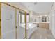Elegant bathroom with soaking tub and double vanity at 2891 Painted Lilly Dr, Las Vegas, NV 89135