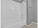 Simple bathroom with a shower/tub combo and grey walls at 2891 Painted Lilly Dr, Las Vegas, NV 89135