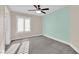Well-lit bedroom featuring a ceiling fan and soothing color palette at 2891 Painted Lilly Dr, Las Vegas, NV 89135