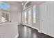 Bright entrance hall with double doors and hardwood floor at 2891 Painted Lilly Dr, Las Vegas, NV 89135