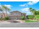 Two-story house with a three-car garage and landscaped yard at 2891 Painted Lilly Dr, Las Vegas, NV 89135