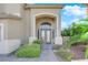 Elegant double front doors with a stone pathway at 2891 Painted Lilly Dr, Las Vegas, NV 89135