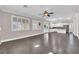 Spacious living area featuring hardwood floors and an open floor plan at 2891 Painted Lilly Dr, Las Vegas, NV 89135