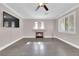 Living room with fireplace and hardwood floors at 2891 Painted Lilly Dr, Las Vegas, NV 89135