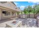 Outdoor kitchen with grill and fire pit at 2891 Painted Lilly Dr, Las Vegas, NV 89135