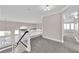 Upstairs hallway with high ceilings and neutral color palette at 2891 Painted Lilly Dr, Las Vegas, NV 89135