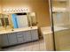 Bathroom boasting double sinks, vanity mirror, tub, and enclosed shower at 2925 Wigwam Pkwy # 811, Henderson, NV 89074