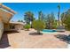 Inviting backyard oasis with a sparkling pool and spa at 3360 Paso Andres St, Las Vegas, NV 89146