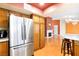 Kitchen with stainless steel appliances and wood cabinets at 3360 Paso Andres St, Las Vegas, NV 89146