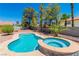 Stunning kidney shaped pool and spa with ample patio space at 3360 Paso Andres St, Las Vegas, NV 89146