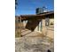 Backyard featuring a covered patio area and desert landscaping at 3551 Rio Mayo Dr, Las Vegas, NV 89121