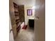 Cozy bathroom with tiled shower, dark wood vanity, and ceramic tile floors at 3551 Rio Mayo Dr, Las Vegas, NV 89121