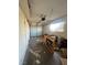 Garage with overhead door, concrete floors, and space for parking and storage at 3551 Rio Mayo Dr, Las Vegas, NV 89121