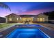 Relaxing backyard oasis featuring a refreshing pool, lounge chairs, and inviting patio furniture at 4292 Helena Cove Ct, Las Vegas, NV 89129