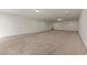 An enormous bonus room with recessed lights is carpeted and has plenty of room for all activities at 4439 Melrose Abbey Pl, Las Vegas, NV 89141