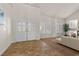 Open foyer with high ceilings, tile floors, and natural light, creating an inviting atmosphere at 4439 Melrose Abbey Pl, Las Vegas, NV 89141