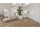 Open-concept living space showcases high ceilings and seamless transition from carpet to tile at 4439 Melrose Abbey Pl, Las Vegas, NV 89141