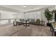 Loft space with comfortable seating and lots of natural light from shuttered windows at 4439 Melrose Abbey Pl, Las Vegas, NV 89141
