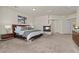 Serene bedroom with a fireplace, a king-size bed, and recessed lighting at 4439 Melrose Abbey Pl, Las Vegas, NV 89141