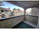 Private balcony overlooks the community with views of neighboring buildings at 4708 Obannon Dr # C, Las Vegas, NV 89102