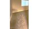 Carpeted bedroom with neutral walls and large window at 4708 Obannon Dr # C, Las Vegas, NV 89102