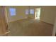 Spacious bedroom with neutral carpeting and multiple windows with blinds at 4708 Obannon Dr # C, Las Vegas, NV 89102