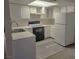 Well-equipped kitchen with white cabinets and modern appliances at 4708 Obannon Dr # C, Las Vegas, NV 89102