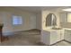 Modern kitchen with white cabinets and stainless steel appliances at 4708 Obannon Dr # C, Las Vegas, NV 89102