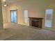 Spacious living room with fireplace and patio access at 4708 Obannon Dr # C, Las Vegas, NV 89102