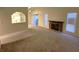 Living room with fireplace and access to kitchen at 4708 Obannon Dr # C, Las Vegas, NV 89102