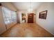 Spacious dining room with tiled floor, chandelier, and built in hutch at 5873 Corazon Dr, Las Vegas, NV 89103