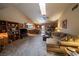 Bright living room with a comfortable sofa and stone fireplace at 5873 Corazon Dr, Las Vegas, NV 89103
