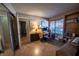 Well-lit office features tiled flooring, built-in shelves, and a comfortable workspace at 5873 Corazon Dr, Las Vegas, NV 89103