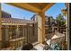 Cozy outdoor balcony with patio seating and views of the complex buildings at 5940 Palmilla St # 9, North Las Vegas, NV 89031