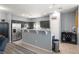 Well-equipped kitchen with stainless steel appliances and gray cabinets blends style with functionality at 5940 Palmilla St # 9, North Las Vegas, NV 89031