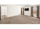 Spacious carpeted bedroom with neutral walls and large windows at 5956 Sierra Medina Ave, Las Vegas, NV 89139