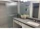 Bathroom with gray countertops, a walk-in shower, and modern vanity at 6250 W Flamingo Rd # 88, Las Vegas, NV 89103