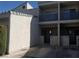 Two-story building exterior with private entrances and parking at 6250 W Flamingo Rd # 88, Las Vegas, NV 89103