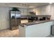 Modern kitchen with stainless steel appliances and gray countertops at 6250 W Flamingo Rd # 88, Las Vegas, NV 89103