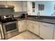 Updated kitchen featuring stainless steel appliances and gray countertops at 6250 W Flamingo Rd # 88, Las Vegas, NV 89103