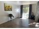 Bright living room with hardwood floors and sliding glass doors at 6250 W Flamingo Rd # 88, Las Vegas, NV 89103