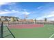 Outdoor basketball court with green and red surface at 6867 Evening Orchid St, North Las Vegas, NV 89086